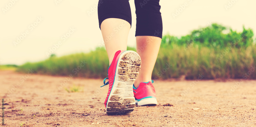 Runner jogging at the sand