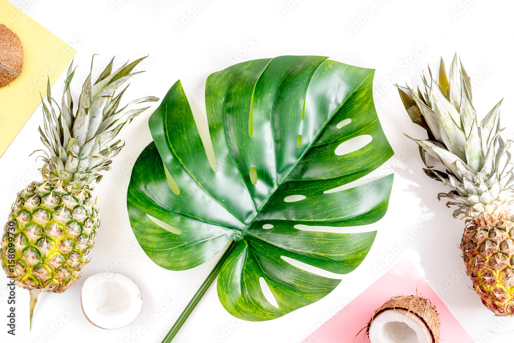 summer mix with pineapple and coconut white background top view mockup