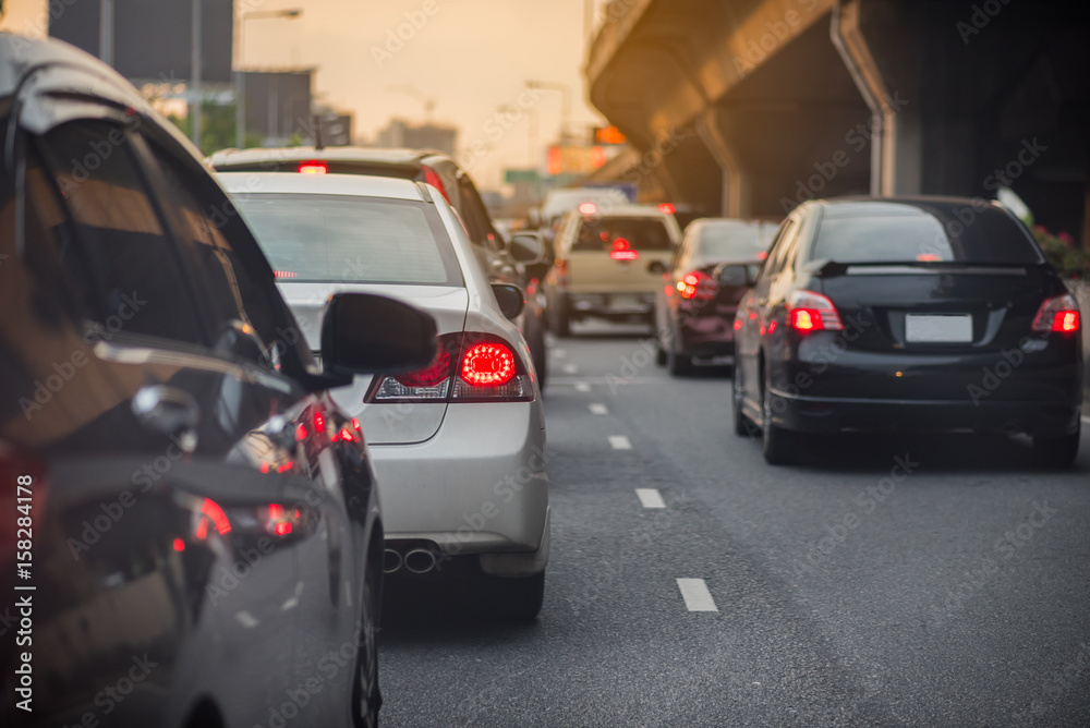 traffic jam with row of cars on high way to the city