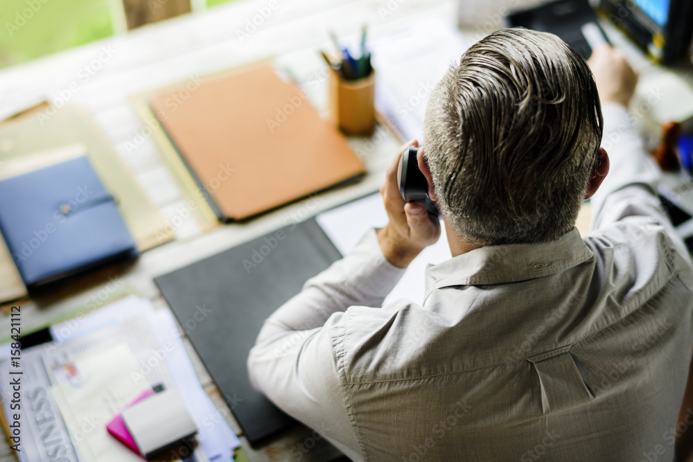 Businesspeople Answering the Phone Call