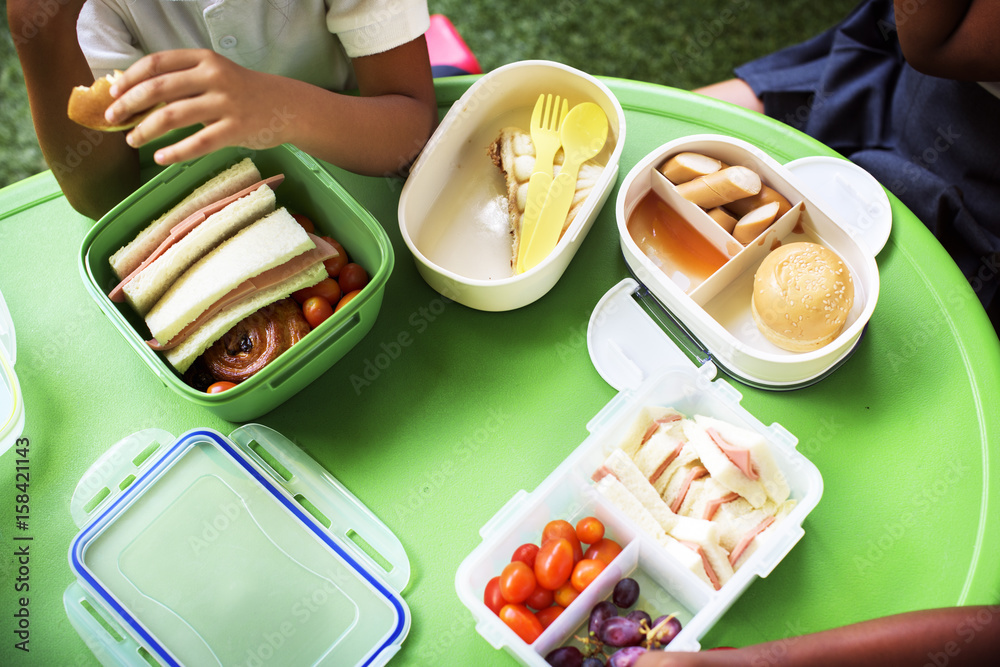 Group of Kindergarten Students Eating Food Lunch Break Together