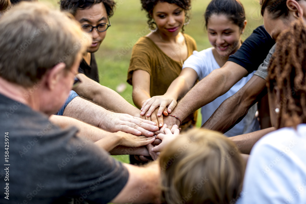 Group of people holding hand assemble togetherness