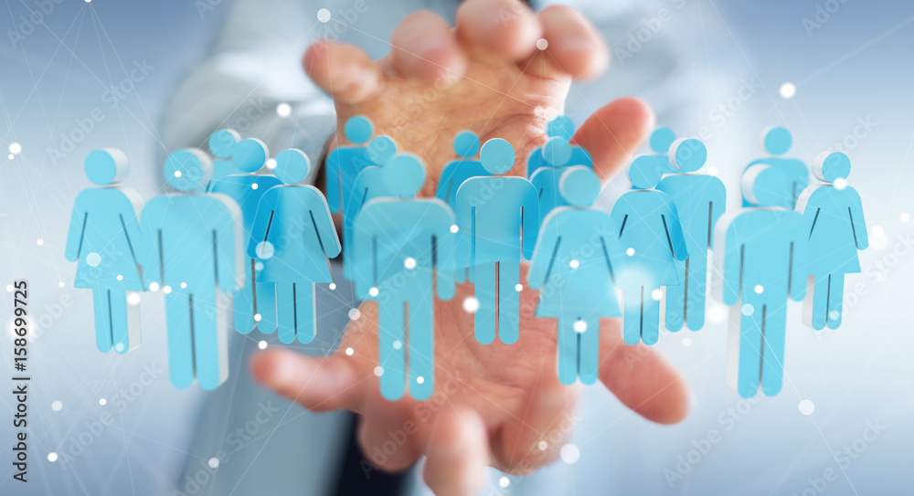 Businessman holding 3D rendering group of people in his hand