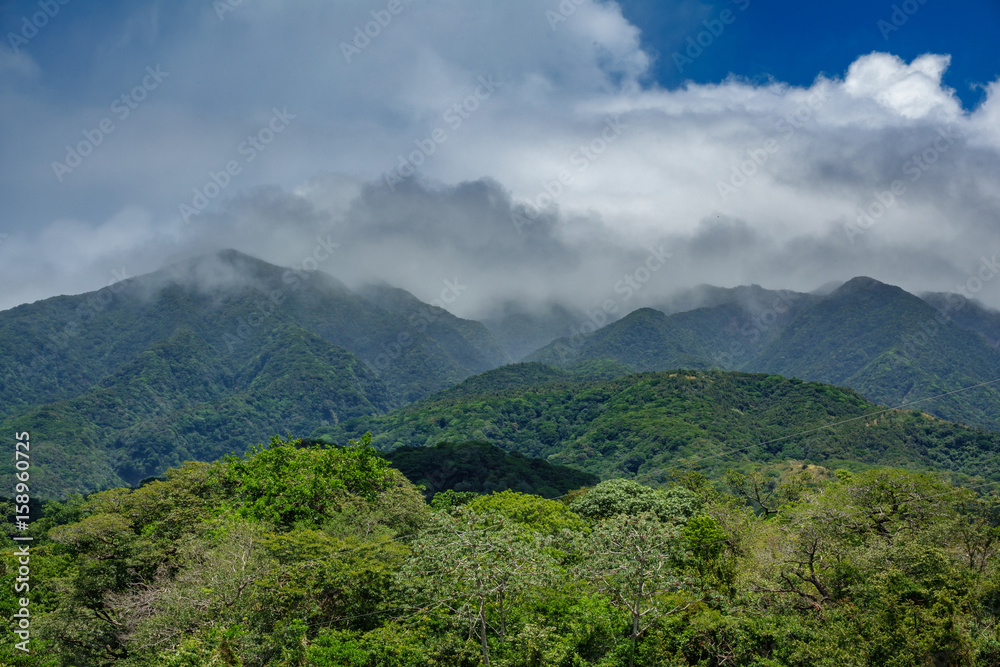 Rincon de la vieja vulcano and misty clouds