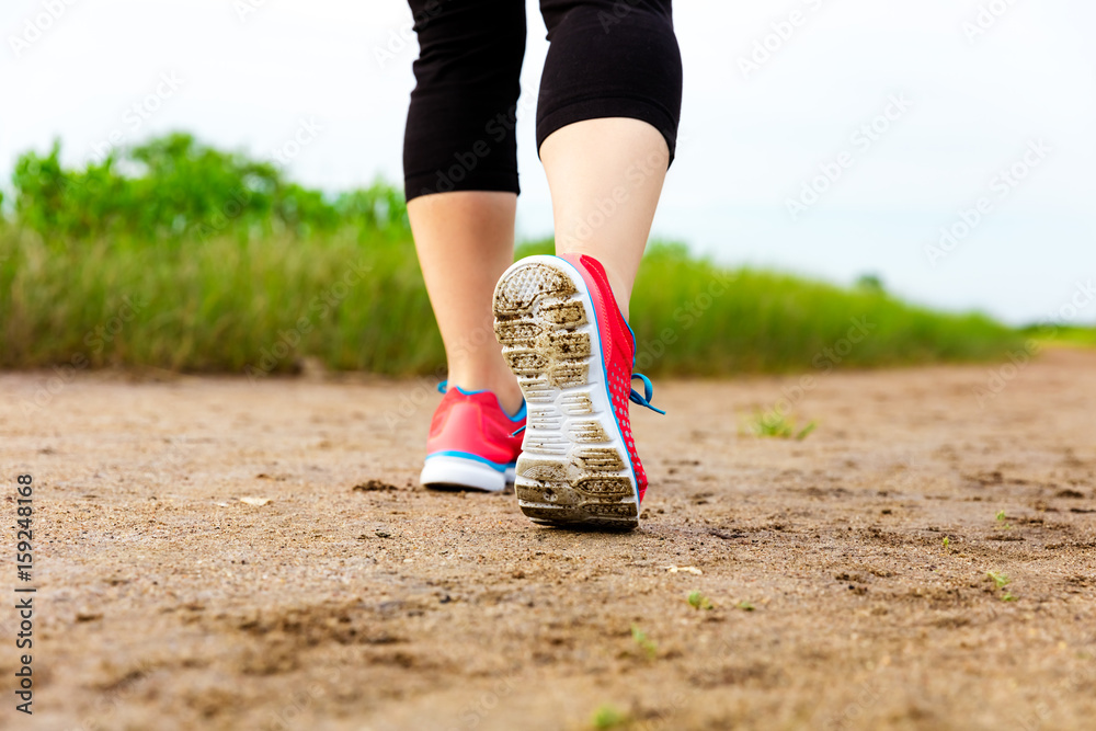 Runner jogging at the sand