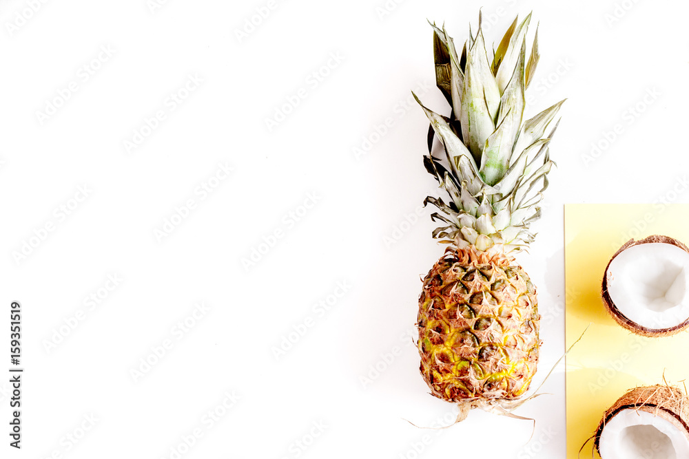 summer mix with pineapple and coconut white background top view mockup