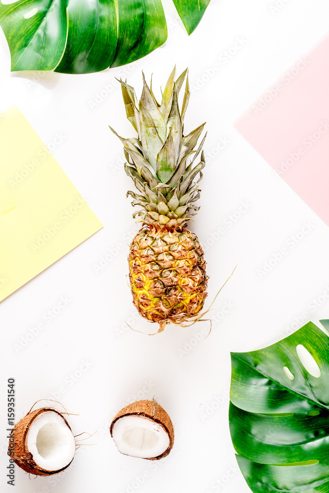 summer mix with pineapple and coconut white background top view mockup