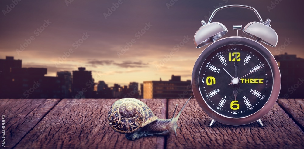 Composite image of close up of alarm clock