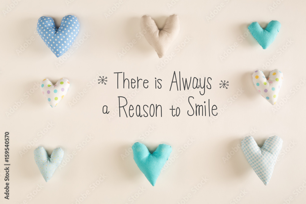 There Is Always A Reason To Smile message with blue heart cushions