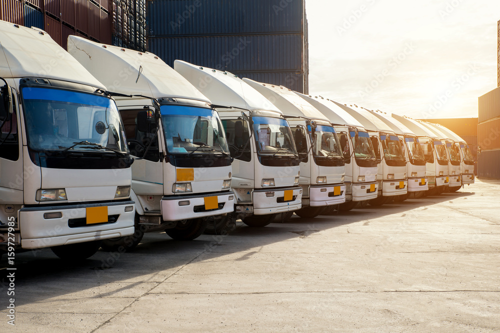 Container truck in depot at porrt. Logistics import export background and transport industry concept