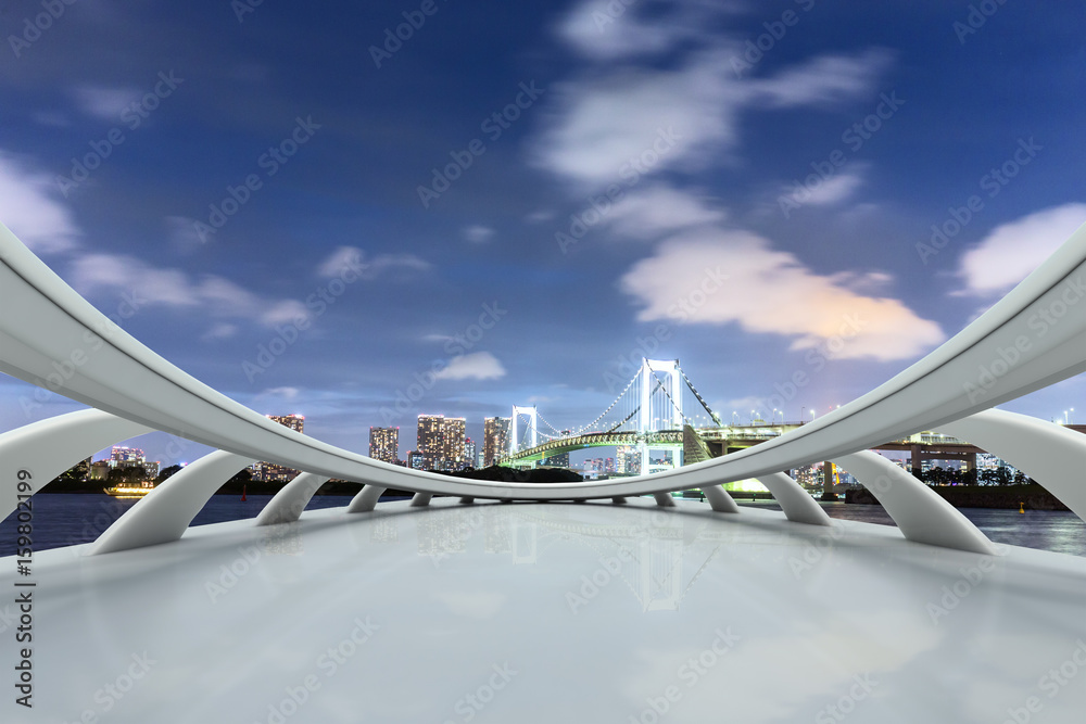 empty pedestrians sidewalk with modern suspension bridge