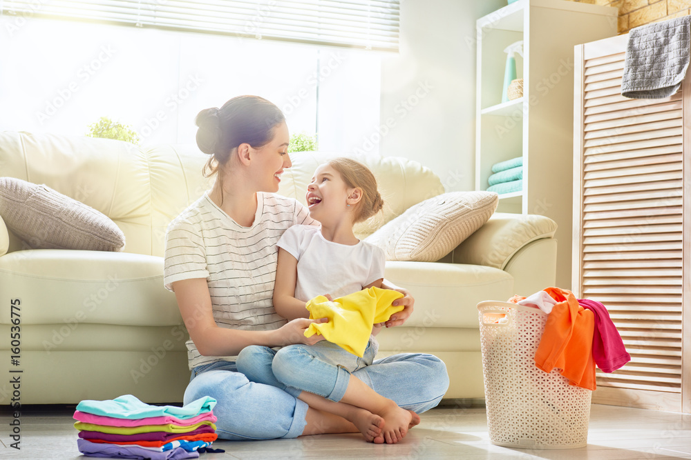 family doing laundry at home