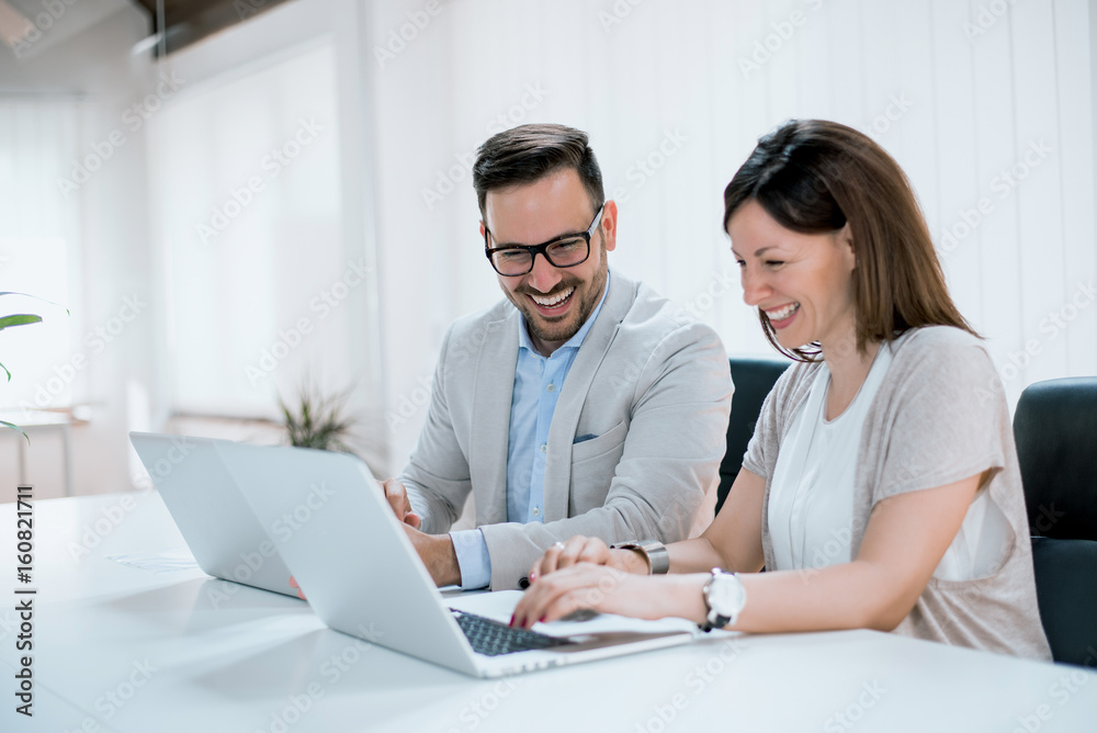 Business people in modern office.