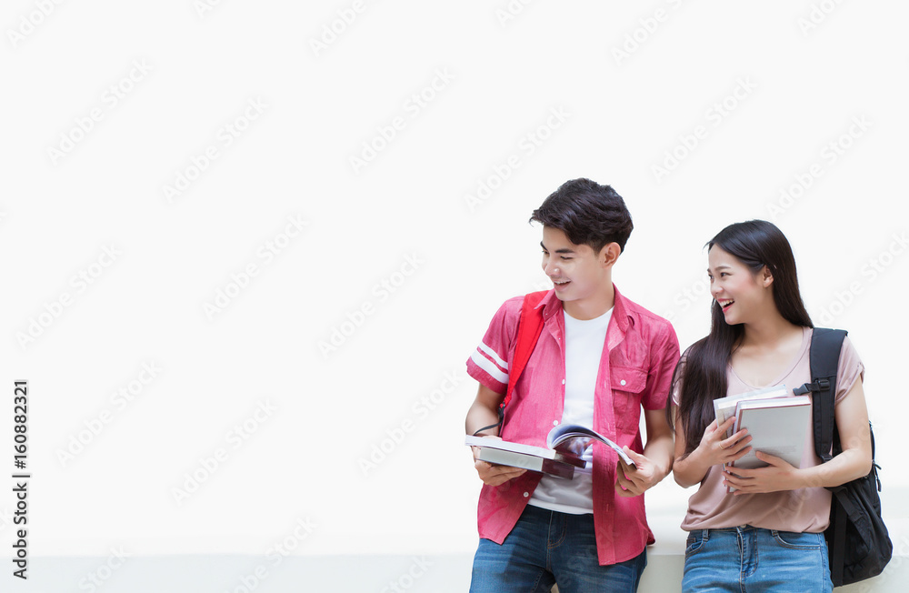 Asian students are reading books. at the university library.white background