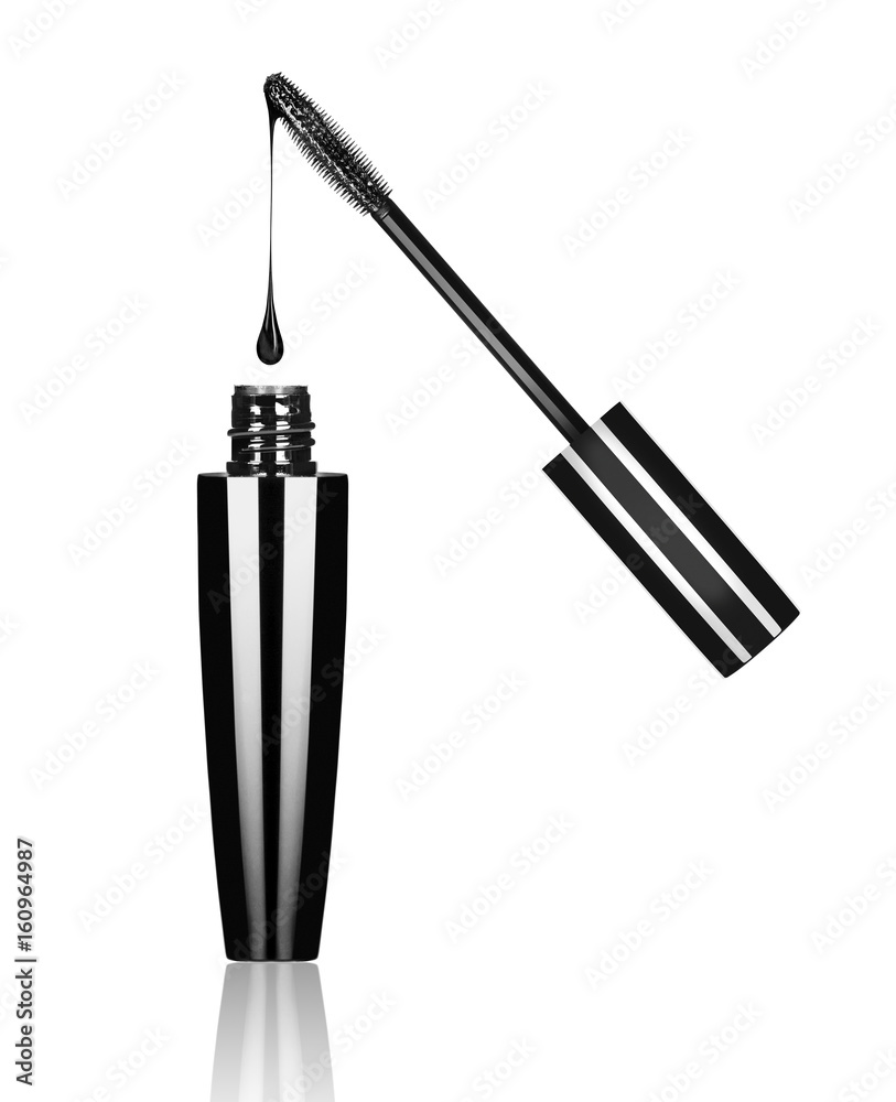 Close-up of black mascara brush with drop on white background