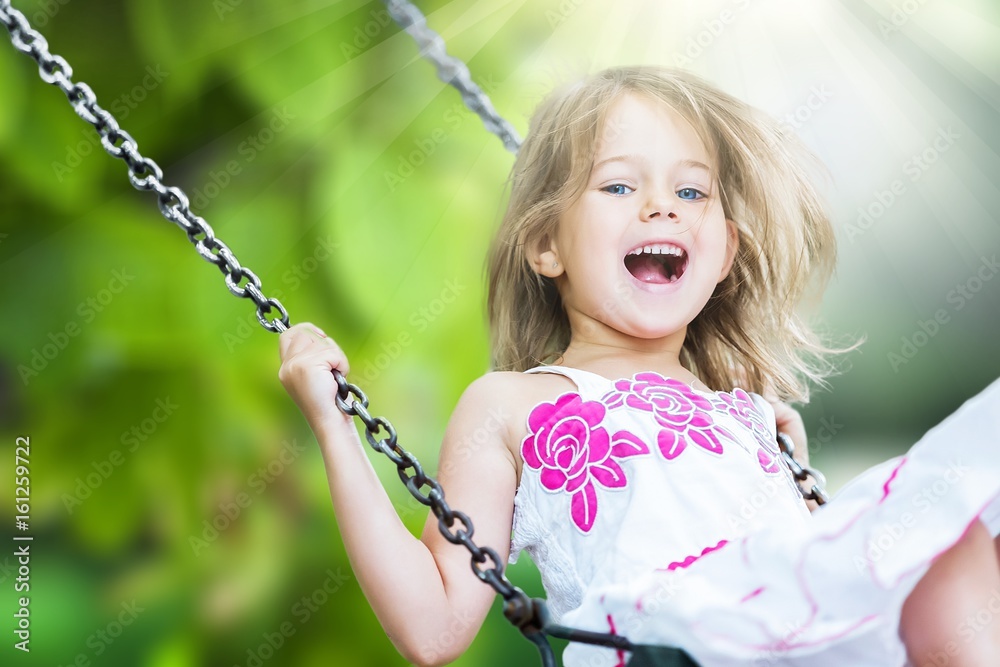 Child on swing.