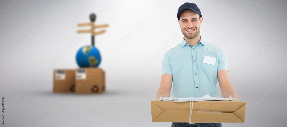 Composite image of handsome courier man with parcel