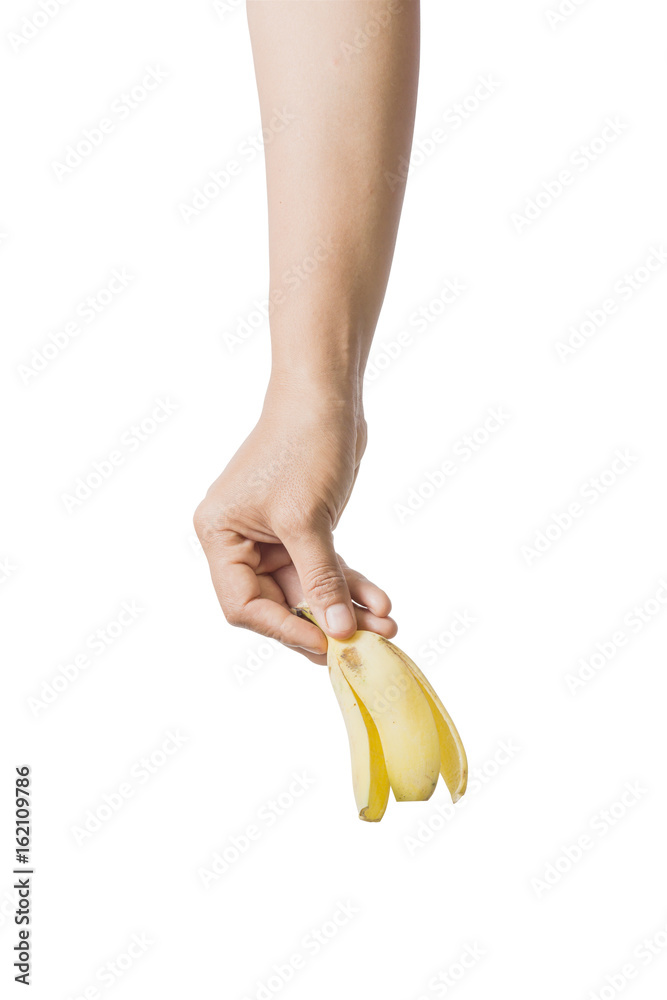 Hand holding banana peel isolated on white background. File contains a clipping path