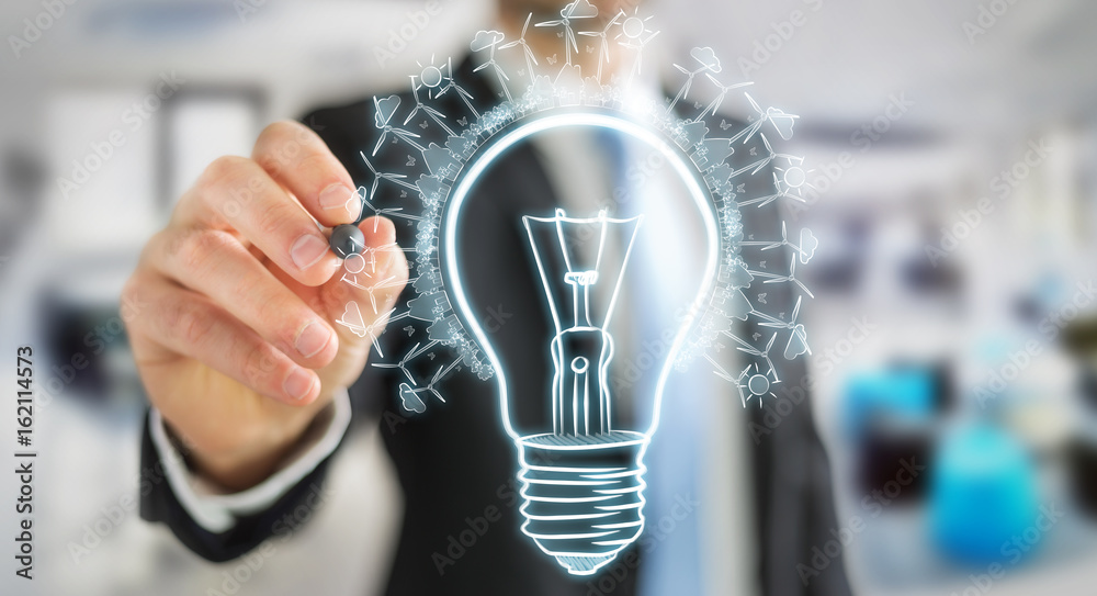 Businessman drawing renewable eco lightbulb sketch