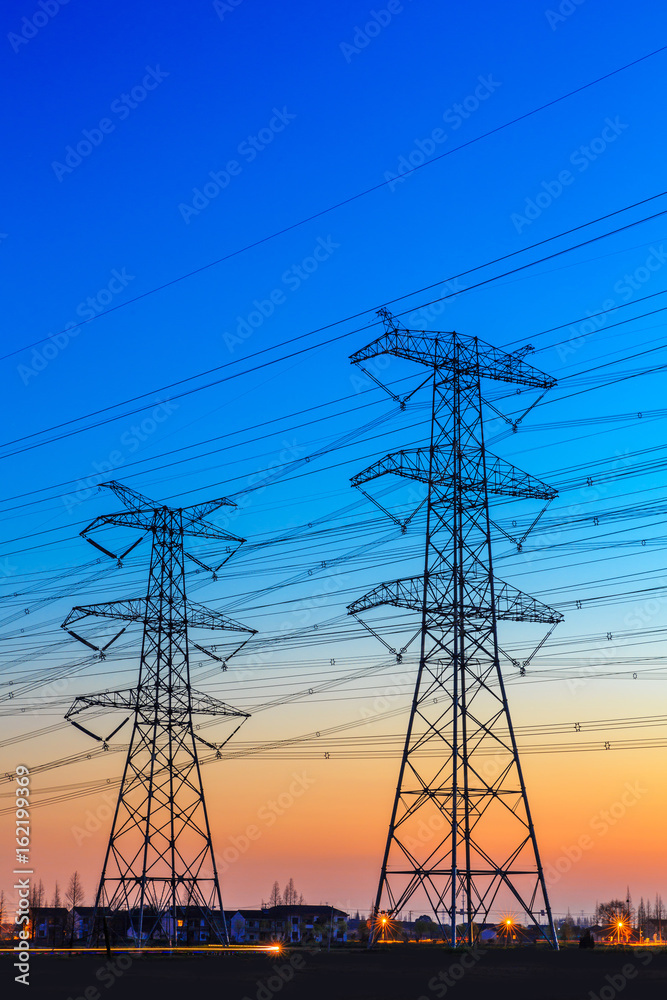 high voltage post,High voltage tower sky sunset background