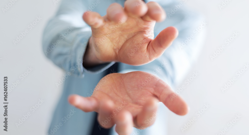 Businessman showing his empty hand