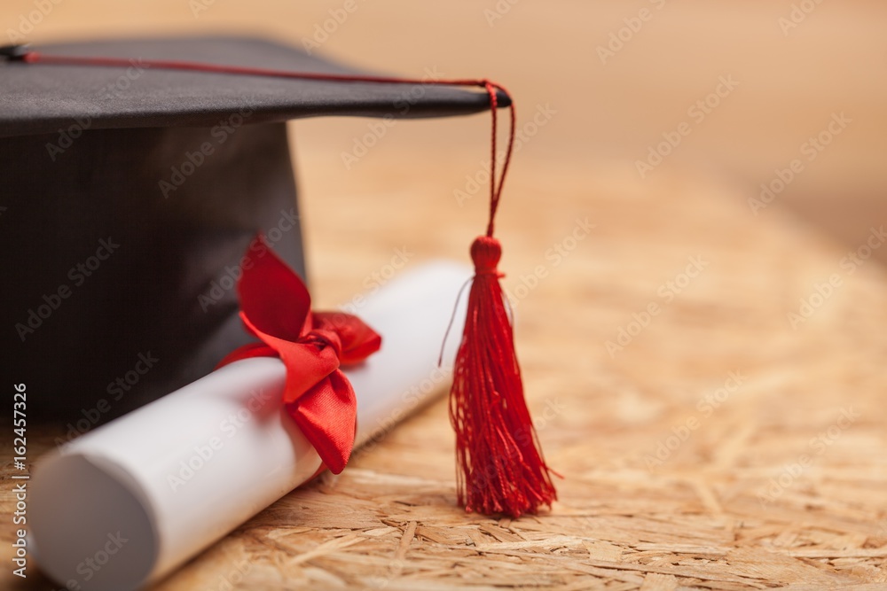 Graduation cap and diploma.