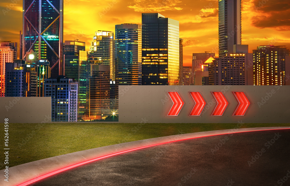 Asphalt road with arrow fluorescent light signs and night scene city skyline background