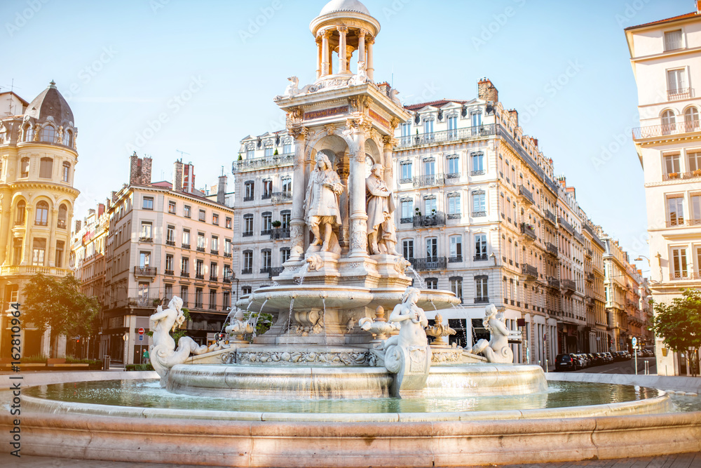 Morning view on Jacobins square and beautiful fountain in Lyon city, France