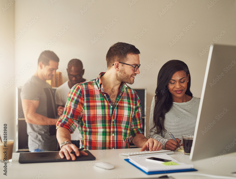 The group of entrepreneurs working in office