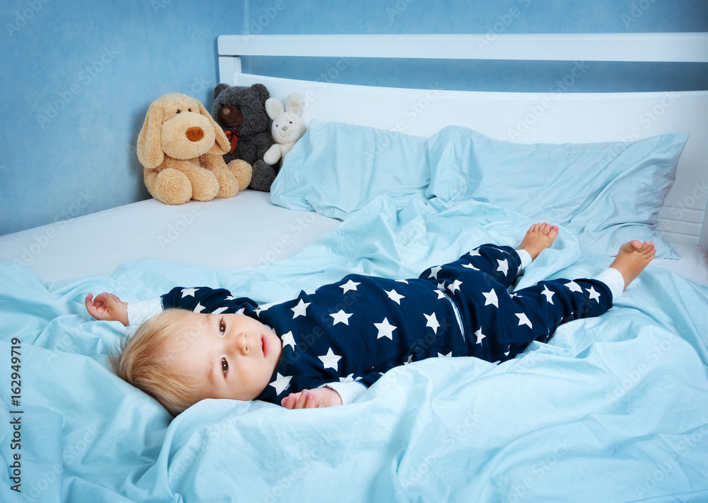 One year old baby in the bed