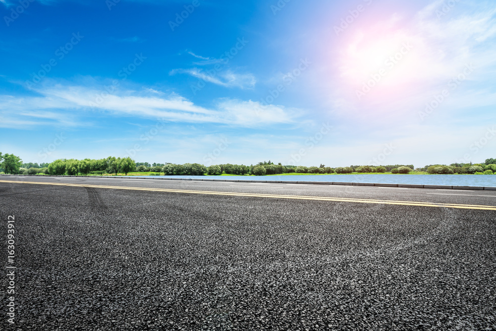 Asphalt road and sky cloud landscape