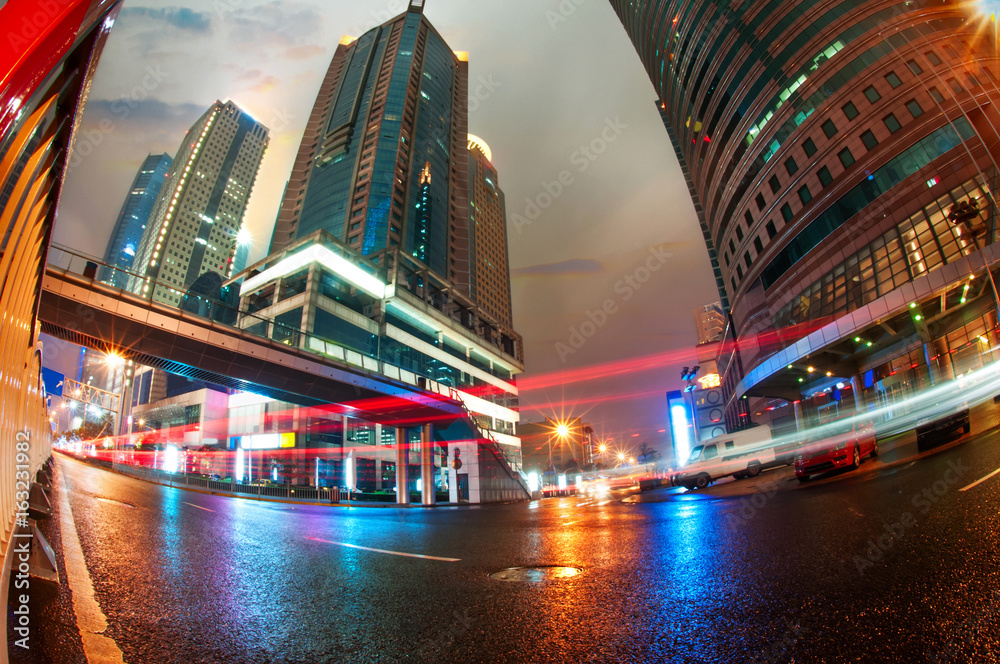 the light trails on the modern building background in shanghai china