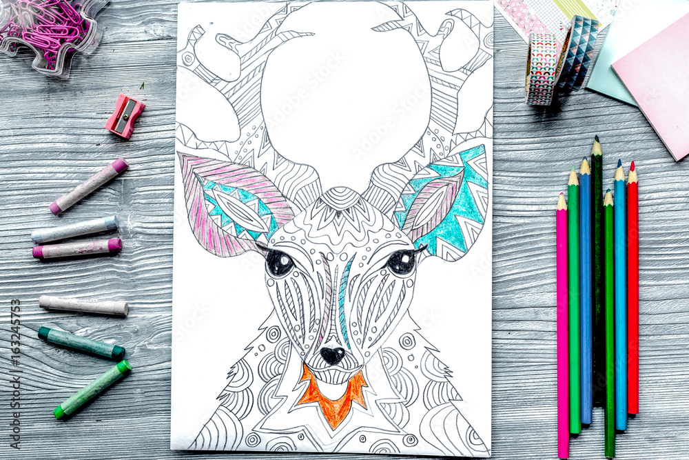 coloring picture for adults on wooden background top view