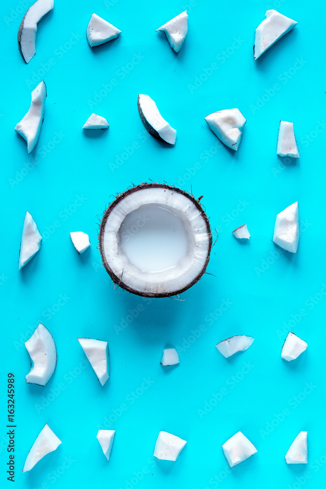 concept organic cosmetics with coconut on blue background top vi