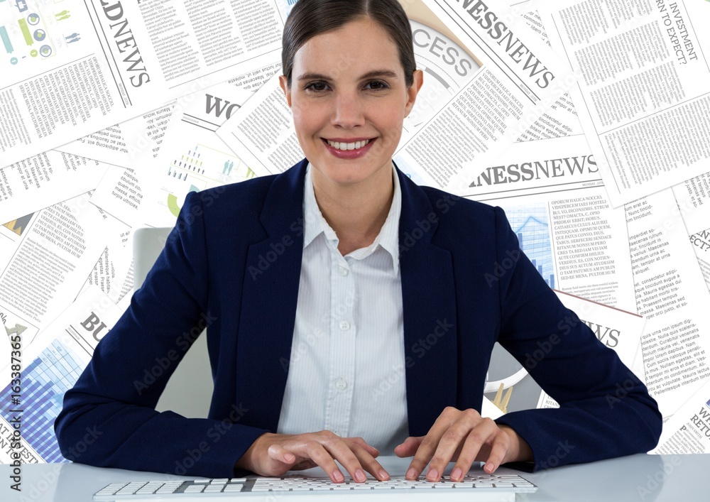 Business woman at desk against document backdrop