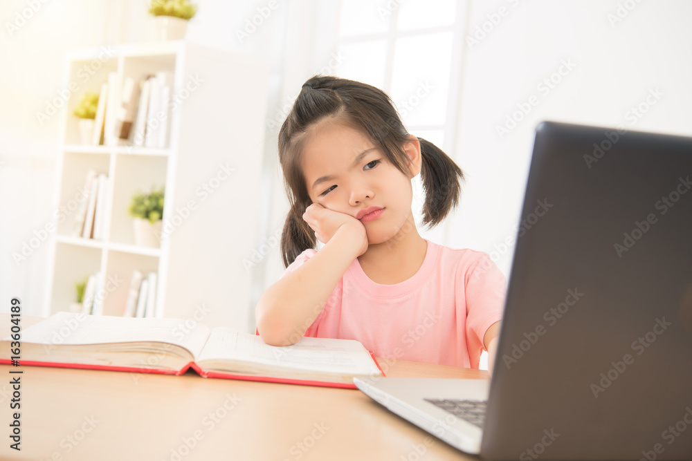 cute asian little daughter girl looking confused