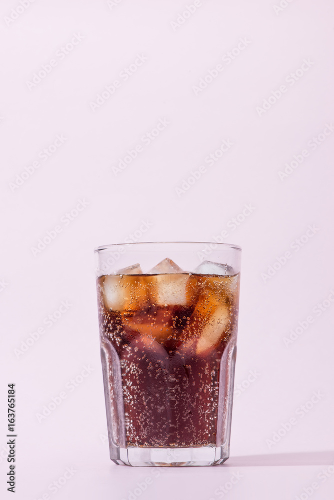 Cola and ice cubes in a glass