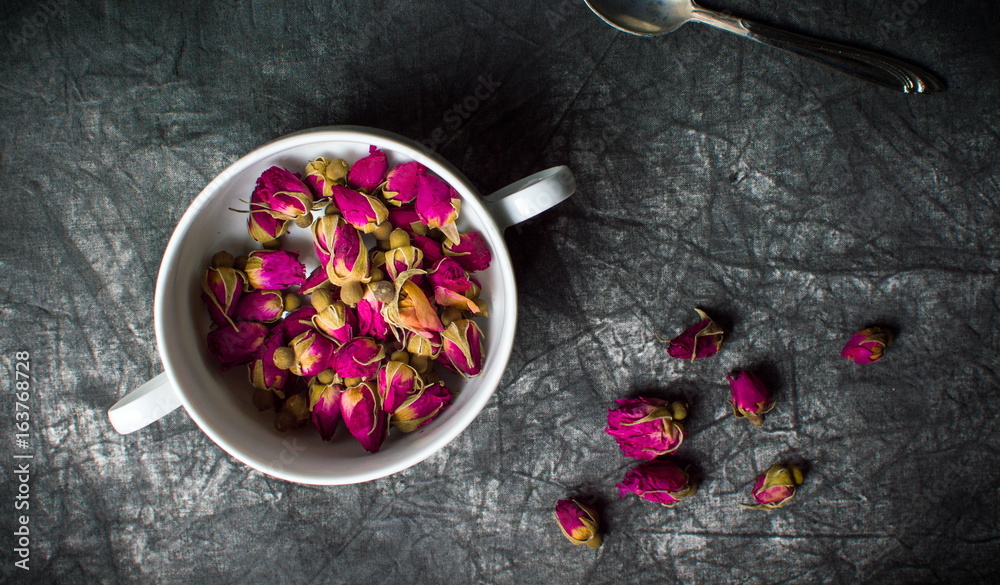 Small rose tea flowers in a cup