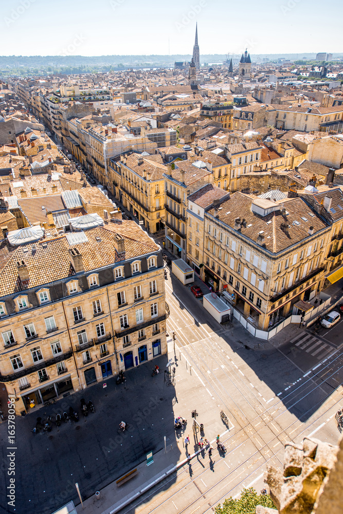 Aerial cityscape view on the streets in the old town of Bordeaux city during the sunny day in France