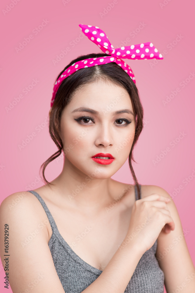 Beautiful woman pinup style portrait. Asian woman.