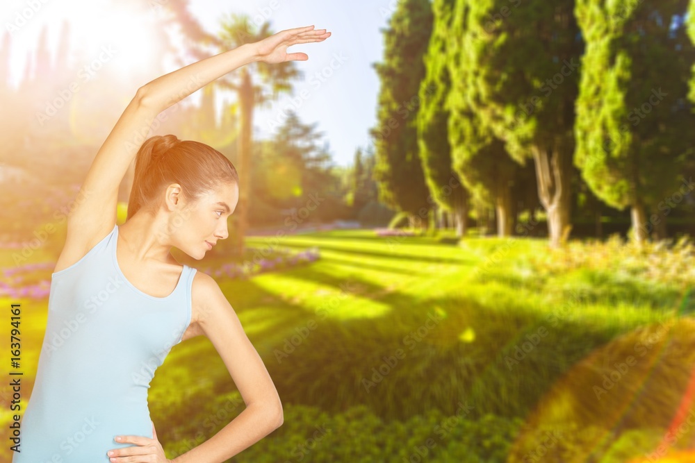 Woman  fitness training session at the park.