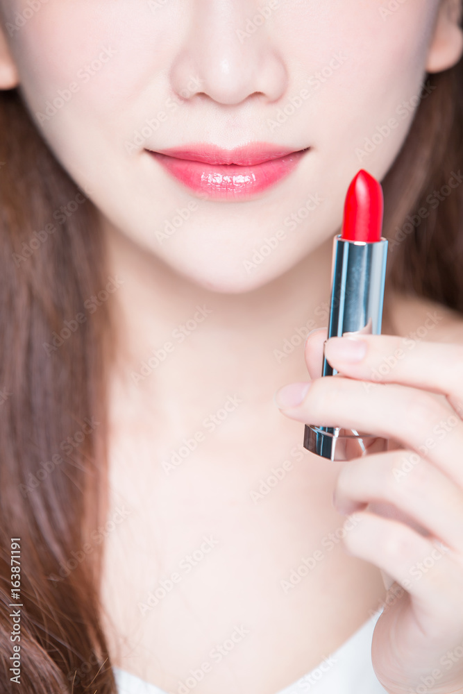 beauty woman take lipstick