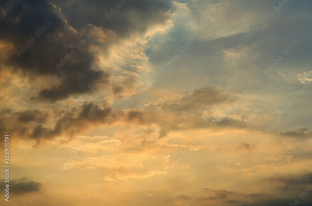 Clouds with light rain, the sun is about to fall evening.