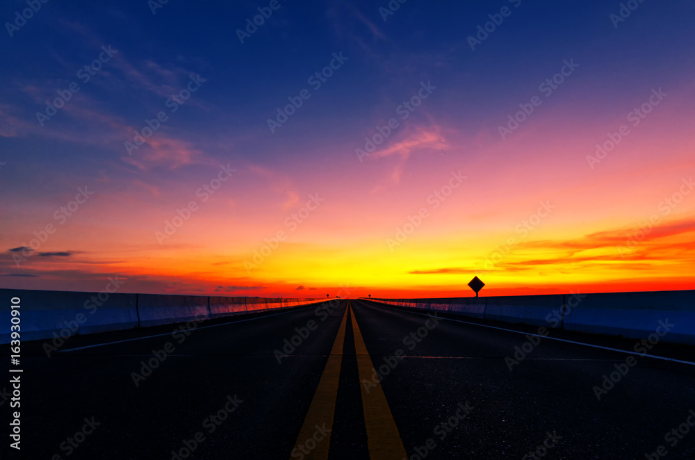 The evening sun on the road in Thailand.