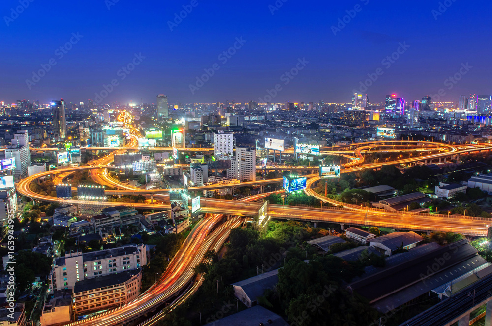 Light vehicles stuck on the highway at night in Bangkok, Thailand on July 10, 2015.