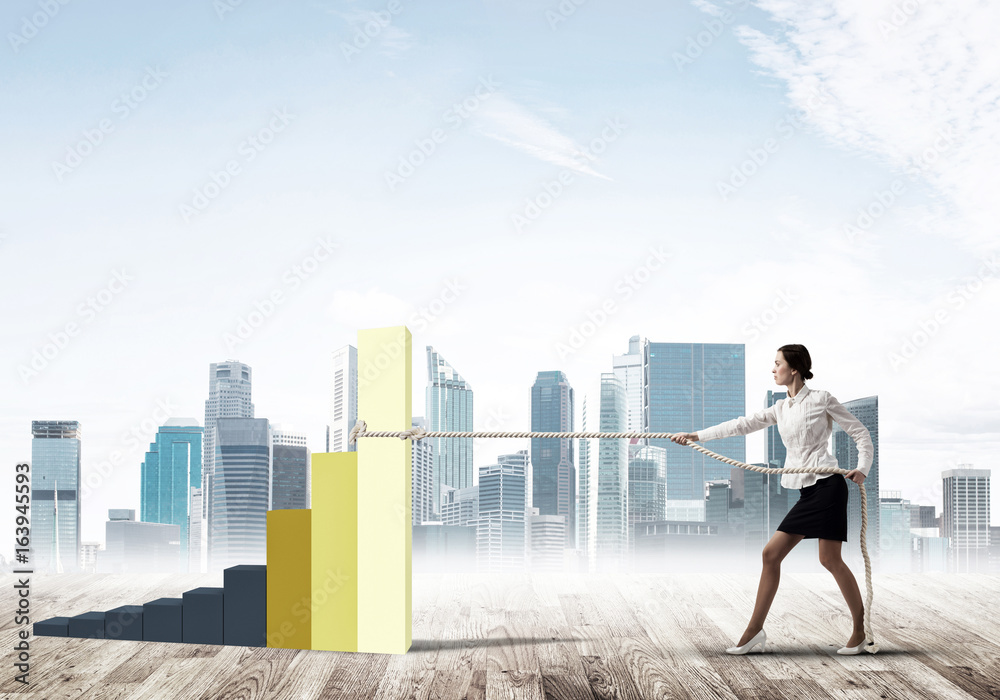 Businesswoman pulling arrow with rope and making it raise up