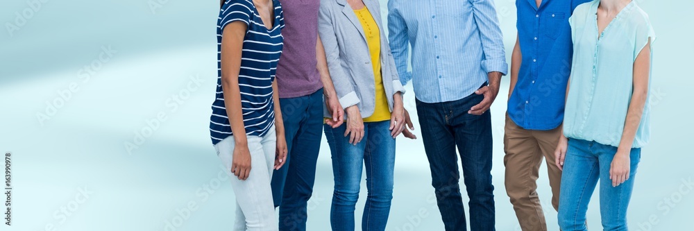 Group of People standing with blurred blue background