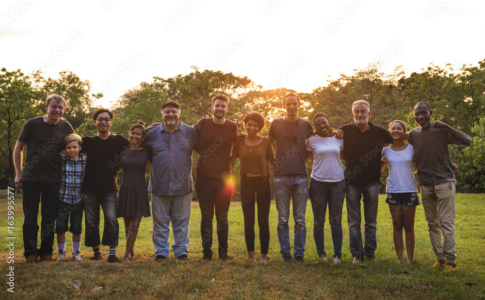 Happiness group of people huddle and smiling together