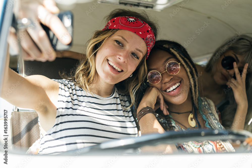 Group of Diverse Friends on Road Trip Taking Selfie Together