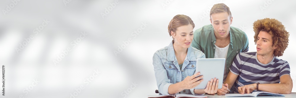 Students on tablet in front of blurred background